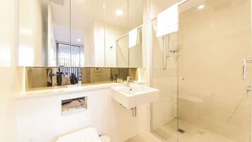 Shower, hair dryer, towels, soap