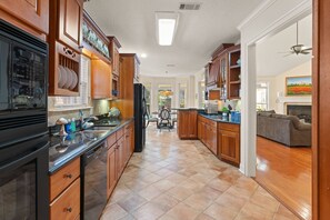 Fridge, oven, stovetop, dishwasher - Monthly Rental – 4BR Pet-Friendly Retreat w/ Office, Bikes, Patio, Near Stables & Village Creek (St. Simons Island)