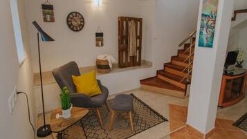 Villa (Three Bedroom Villa with Pool) | Living room | 32-inch flat-screen TV with cable channels
