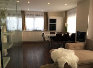 Villa (Four Bedroom Villa) | Living room | 32-inch flat-screen TV with cable channels