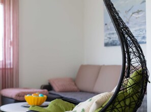 Apartment (One Bedroom Apartment) | Living room | 32-inch flat-screen TV with cable channels - Trendy and Chic Apartment With Terrace and Private Garden (Kastela)