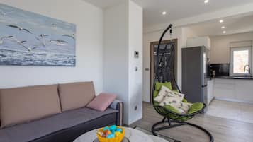 Διαμέρισμα (One Bedroom Apartment) | Καθιστικό | Τηλεόραση με επίπεδη οθόνη 32 ιντσών με καλωδιακά κανάλια