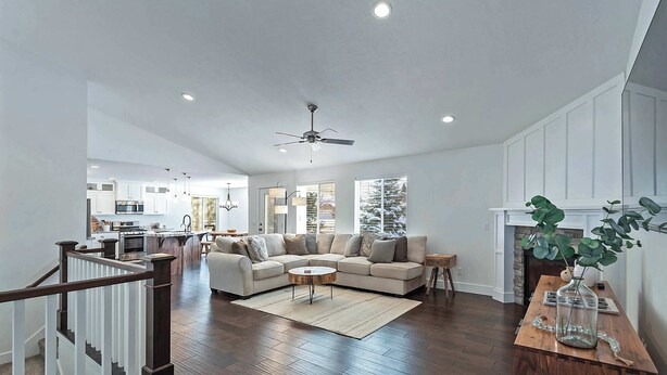 A spacious living room with a sectional sofa, a coffee table, and a fireplace. - 10 Minutes to the Unitas! Full-Home Francis Rental (Kamas)