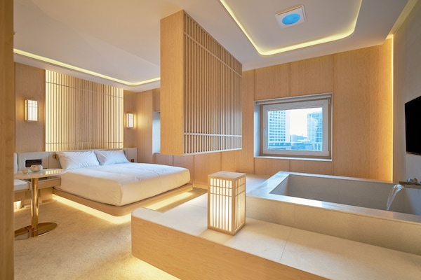 Deluxe Double Spa Room (Randomly Selected) | Blackout drapes, soundproofing, free WiFi, bed sheets