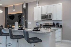 Fridge, microwave, oven, stovetop - Luxury 3BR home with Mario Bros Room Near Disney (Kissimmee)