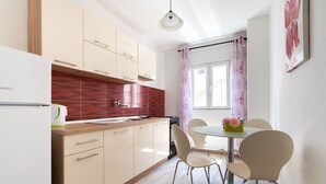 Private kitchen | Fridge, oven, stovetop, electric kettle - Simplistic Holiday Home in Rogoznica Near the Seabeach (Rogoznica)