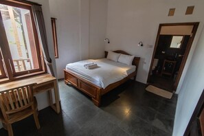 Habitación estándar, vista al jardín | Escritorio, espacio para trabajar con laptop y wifi gratis 