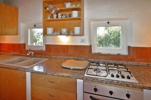 Deluxe House, 2 Bedrooms | Private kitchen | Fridge