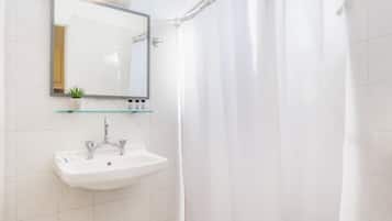 Business Room | Bathroom | Shower, hair dryer, towels, soap
