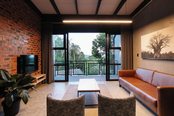 Apartment, 1 Bedroom | Living area | 32-inch flat-screen TV with satellite channels - Menlyn Lofts (Pretoria)