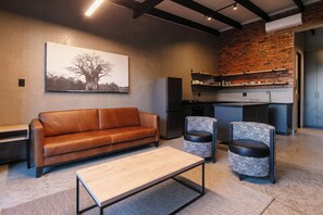 Apartment, 1 Bedroom | Living room | 32-inch flat-screen TV with satellite channels - Menlyn Lofts (Pretoria)