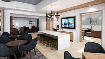 Un hall d’hôtel moderne doté d’un bar central, de différents espaces aménagés pour s’asseoir et d’un écran de télévision.