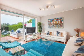 Family Villa, 5 Bedrooms, Non Smoking | Living area | 16-inch TV with cable channels - Sunny 5BR Villa at Prainha Club (Portimão)