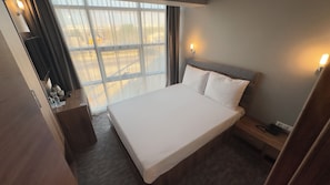 Ropa de cama de alta calidad y minibar 