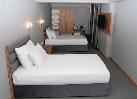 Ropa de cama de alta calidad y minibar