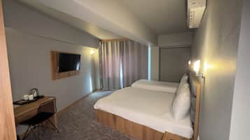 Rom – superior, 2 enkeltsenger | Sengetøy av topp kvalitet, minibar, safe på rommet og skrivebord