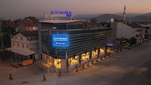 A hotel with a prominent sign reading "ELITEWORLD HOTELS & RESORTS". - Elite World GO  İnegöl  (Inegol)