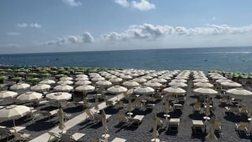 Private beach, white sand, beach cabanas, sun-loungers