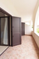 Apartamento, 1 cama doble con sofá cama, Aire acondicionado, vistas al patio | Terraza o patio