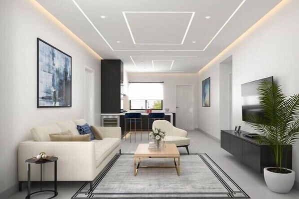 Economy Apartment, Balcony, City View | Living area | Flat-screen TV - Triangle Apartment (Lekki)