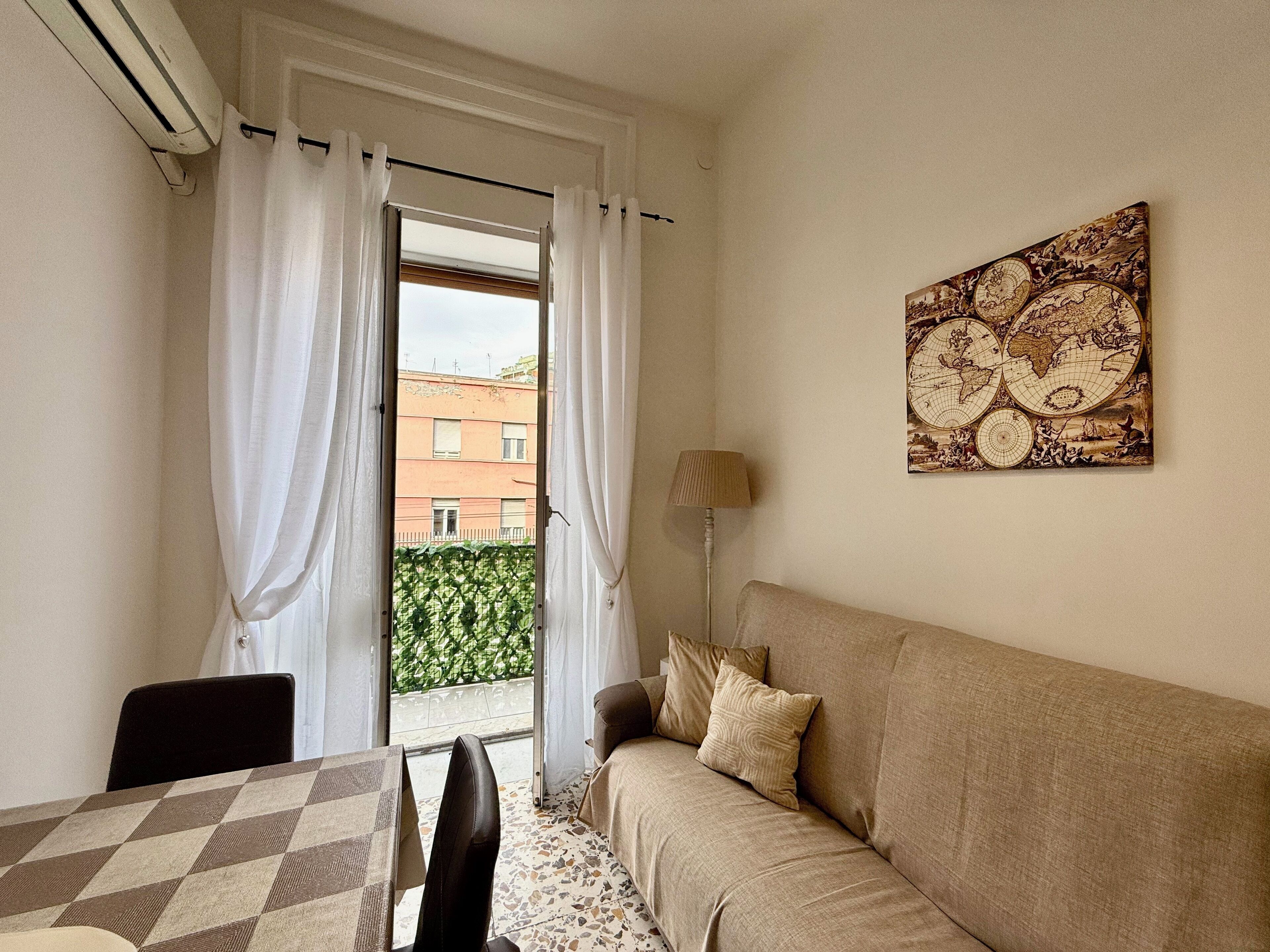 Deluxe Apartment, City View | Living area | Flat-screen TV