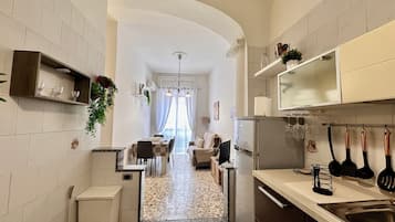 Deluxe Apartment, City View | Private kitchen | Electric kettle, toaster