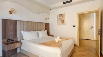 Deluxe Apartment, 2 Bedrooms | Premium bedding, down comforters, pillowtop beds, minibar