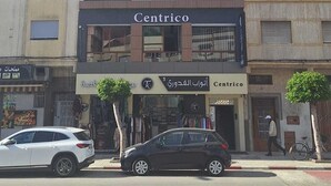 A multi-story building with a storefront labeled "Centrico." - CENTRICO (Tangier)