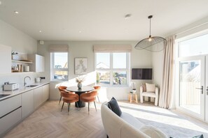 TV - A luxury ground-floor apartment, offering stunning coastal views for up to 4 guests (Anglesey)