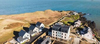 Two luxury apartments nestled in the picturesque coastal village of Bull Bay, sleeps up to 8 guests