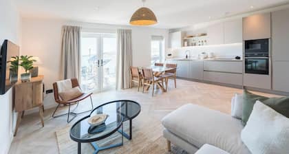 A modern costal apartment in the scenic Bull Bay, offering stunning coastal views for up to 4 guests