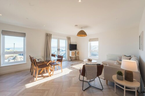 A modern costal townhouse in the scenic Bull Bay, offering stunning coastal views for up to 4 guests