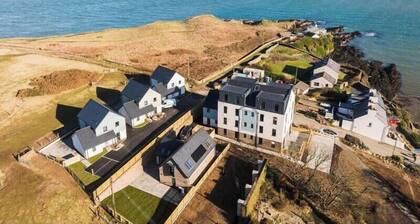 A modern costal townhouse in the scenic Bull Bay, offering stunning coastal views for up to 4 guests