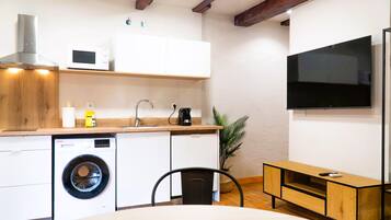 Studio | Living area | 32-inch TV with digital channels