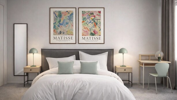 Un dormitorio moderno con una cama grande, dos mesitas de noche con lámparas, un escritorio con silla, y dos obras de arte enmarcadas en la pared.
