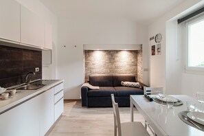 Leilighet | 1 soverom, sengetøy av topp kvalitet, dundyner og strykejern/-brett