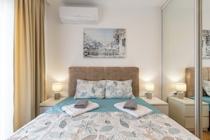 1 habitación, tabla de planchar con plancha, wifi gratis y ropa de cama 