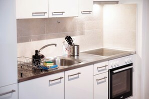 Superior Condo | Private kitchen | Fridge, microwave, oven, stovetop