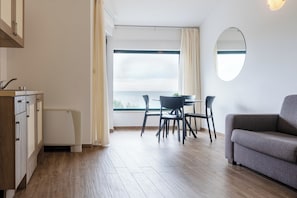Superior Apartment | Living area | 80-cm TV with satellite channels - Amazing Lucija apartments-sea view (Makarska)