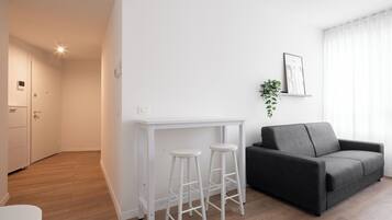 Basic Apartment | Living area | 35-inch TV with digital channels