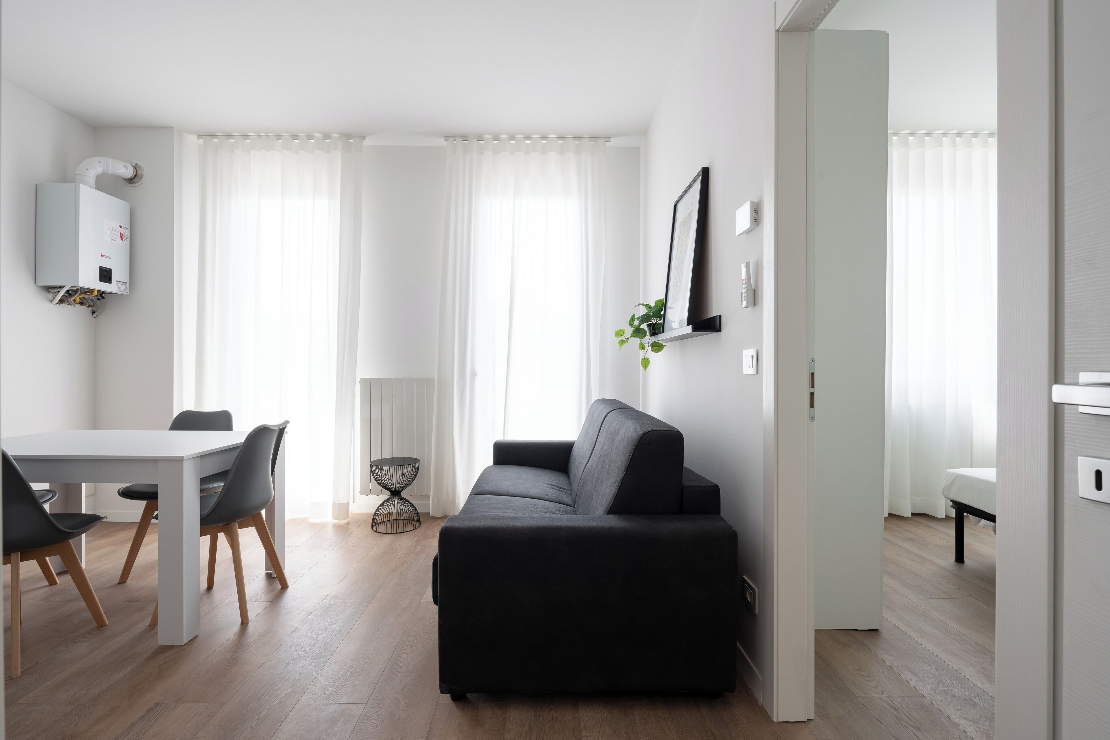 Business Apartment | Living area | 35-inch TV with digital channels