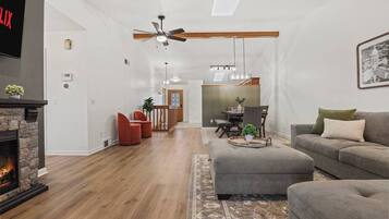 TV, fireplace, books, offices