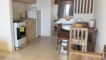 Basic Studio, Balcony, Sea View | Private kitchen | Full-sized fridge, high chair