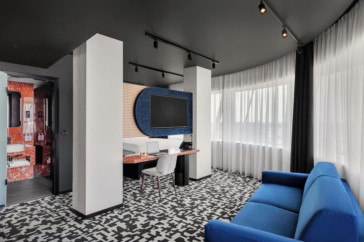 TRIBE MAX | Premium bedding, memory-foam beds, in-room safe, blackout curtains