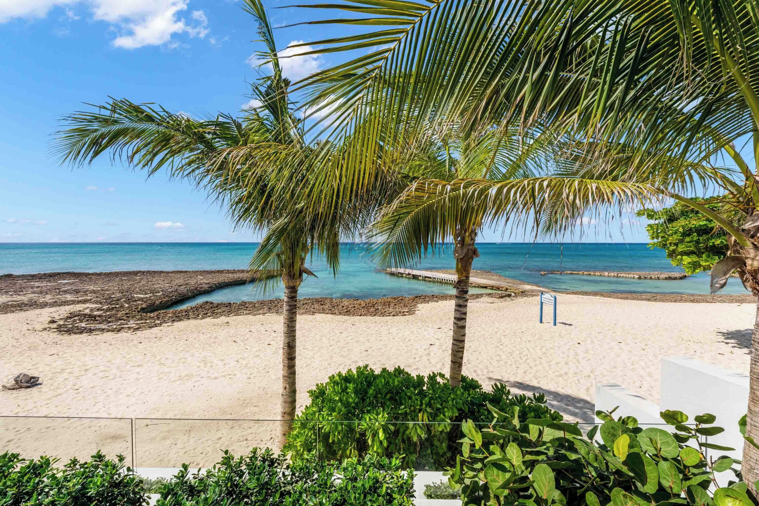 On the beach, sun-loungers, beach towels