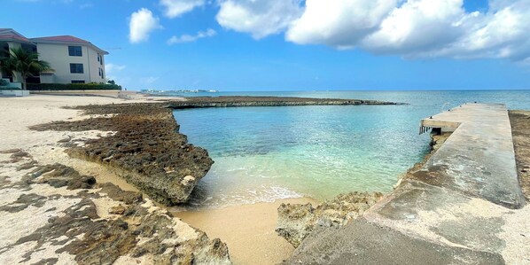 On the beach, sun-loungers, beach towels