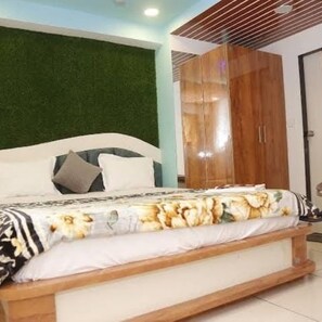 Deluxe Double Room, City View | Free WiFi, bed sheets - Goroomgo The Crown Ahmedabad (Gandhinagar)