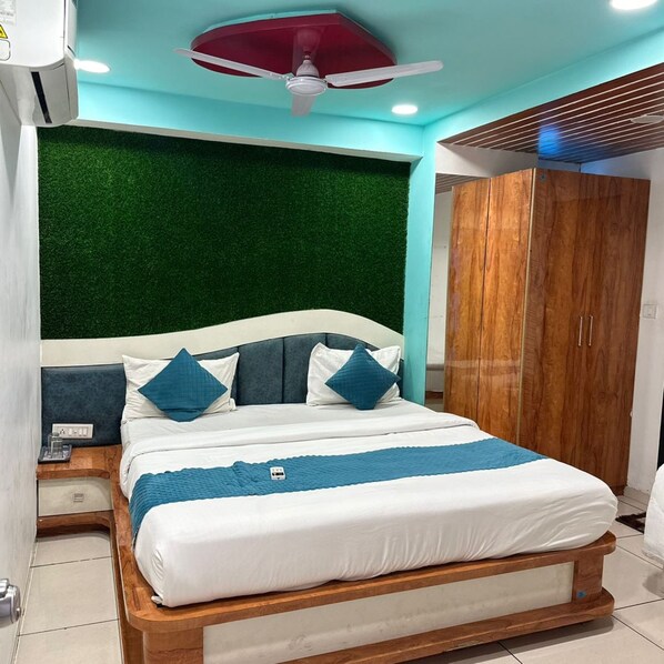 Deluxe Double Room, City View | Free WiFi, bed sheets - Goroomgo The Crown Ahmedabad (Gandhinagar)