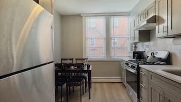 Coffee/tea maker, fridge, microwave, oven