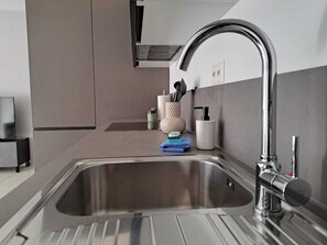 Departamento clásico | Cocina privada | Refrigerador, horno, parrilla de estufa y lavavajillas 